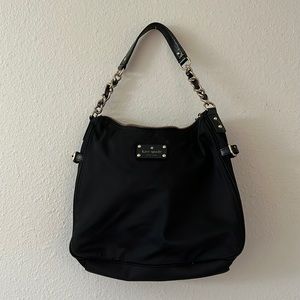 Kate Spade black handbag with polka dot interior